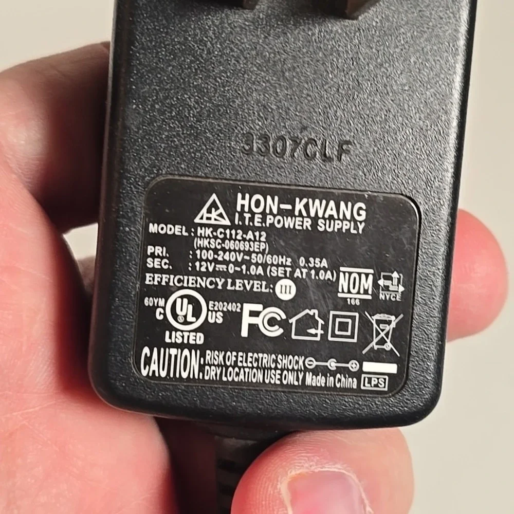 Hon-Kwang‎ (12V/1A) ITE HK-C112-A12 Power Supply Wall Adapter - Black